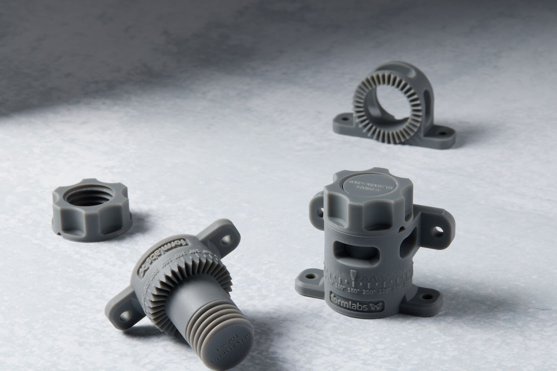 Sample Grey V5 resin parts made with SLA